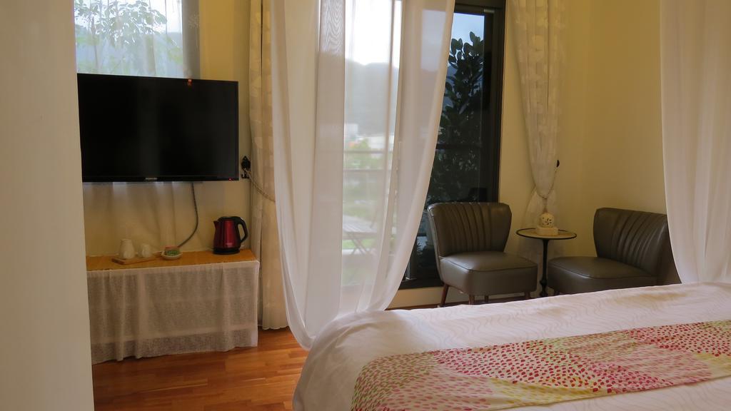Slower Life B&B Jiaoxi Ruang foto